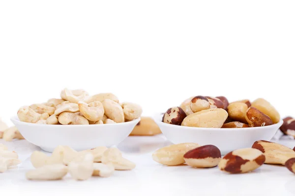 Brazil nuts and cashew on white background — Stock Photo, Image