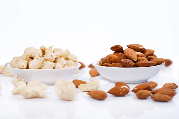 Almond nuts and cashew on white background — Stock Photo, Image