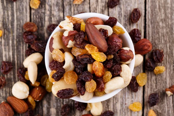 Mixed nuts on a white plate. — Stock Photo, Image