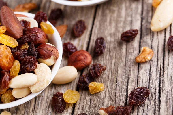 Mixed nuts on a white plate. — Stock Photo, Image