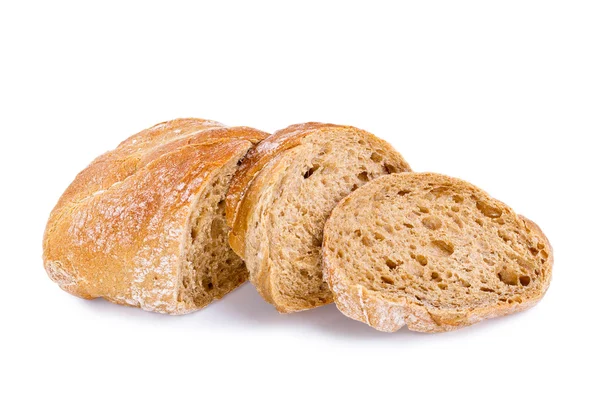 Sabroso pan con rebanadas sobre un fondo blanco . — Foto de Stock