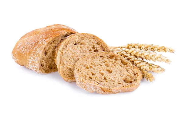 Tasty bread with wheat on a white background. — Stock Photo, Image