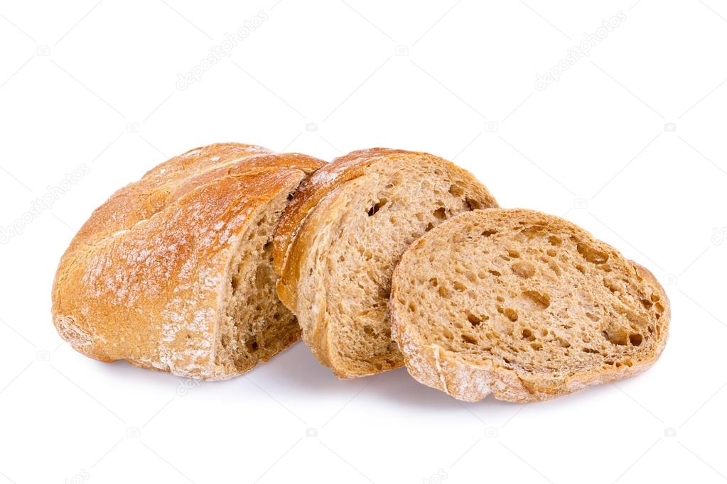 Tasty bread with slices on a white background.