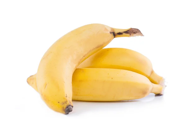 Smaczne banany na białym tle. — Zdjęcie stockowe