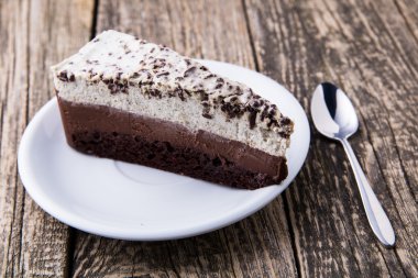 Ahşap zemin üzerine çikolata tatlı.