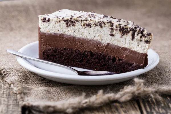 Dessert al cioccolato su sfondo di legno . — Foto Stock