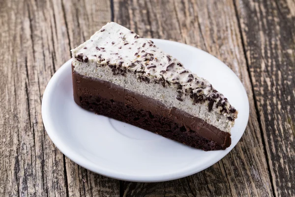 Chocolate dessert on wooden background. — Stock Photo, Image