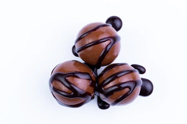 Chocolate candies on a white background. — Stock Photo, Image