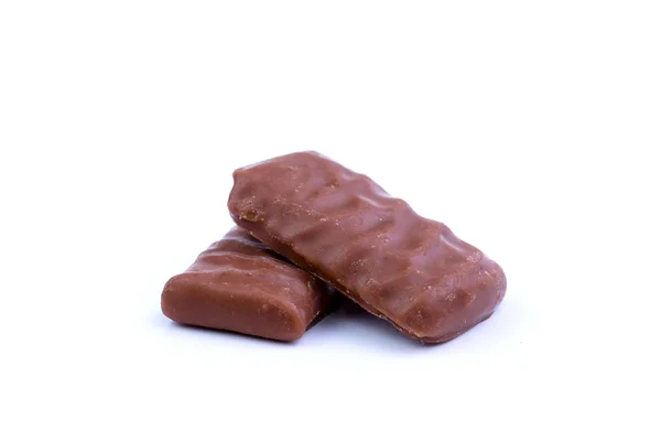 Chocolade snoepjes op een witte achtergrond. — Stockfoto