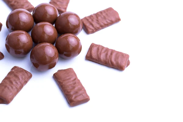 Csokoládé cukorka fehér háttér. — Stock Fotó