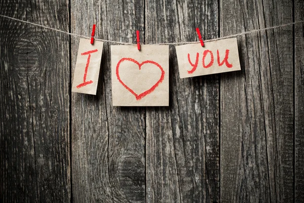 Palabras manuscritas Te amo y corazones sobre fondo de madera . —  Fotos de Stock