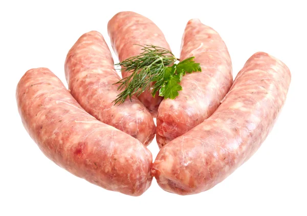 Rauw vlees worstjes met Groenen geïsoleerd op witte achtergrond — Stockfoto