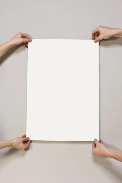 Blank poster on light beige colored background — Stock Photo, Image