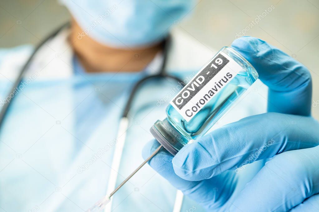 Positive blood infection sample in test tube for covid-19 coronavirus in lab. Scientist holding to check and analyze for patient in hospital.