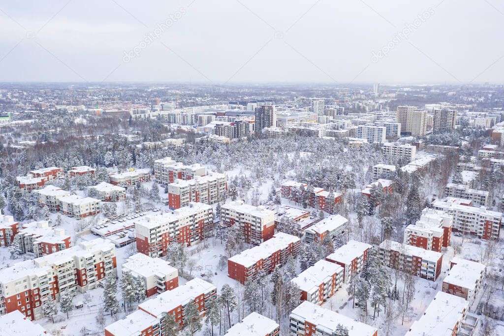 Aerial view of Matinkyla neighborhood of Espoo, Finland. Snow covered city in winter.