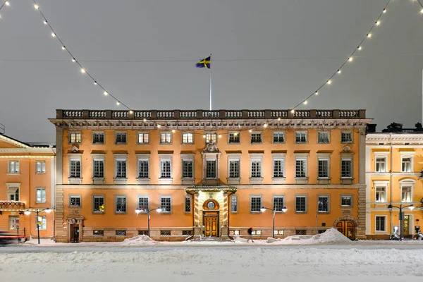 Embassy of Sweden in winter night with Christmas decoration in Helsinki, Finland. The beautiful old classic European architecture.