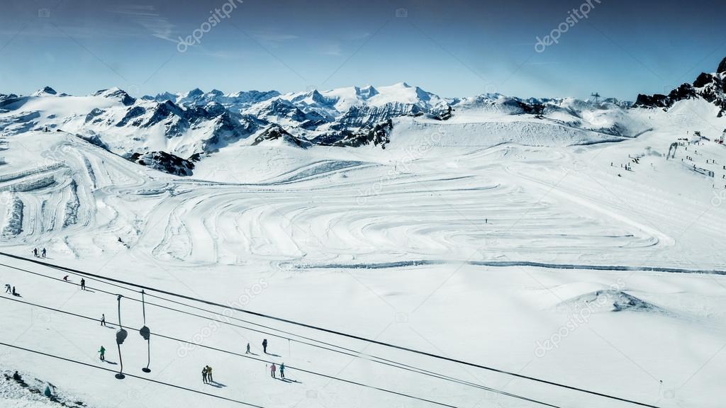 Skiing people and rope tow systems of Kitzsteinhorn, Zell am See ski region