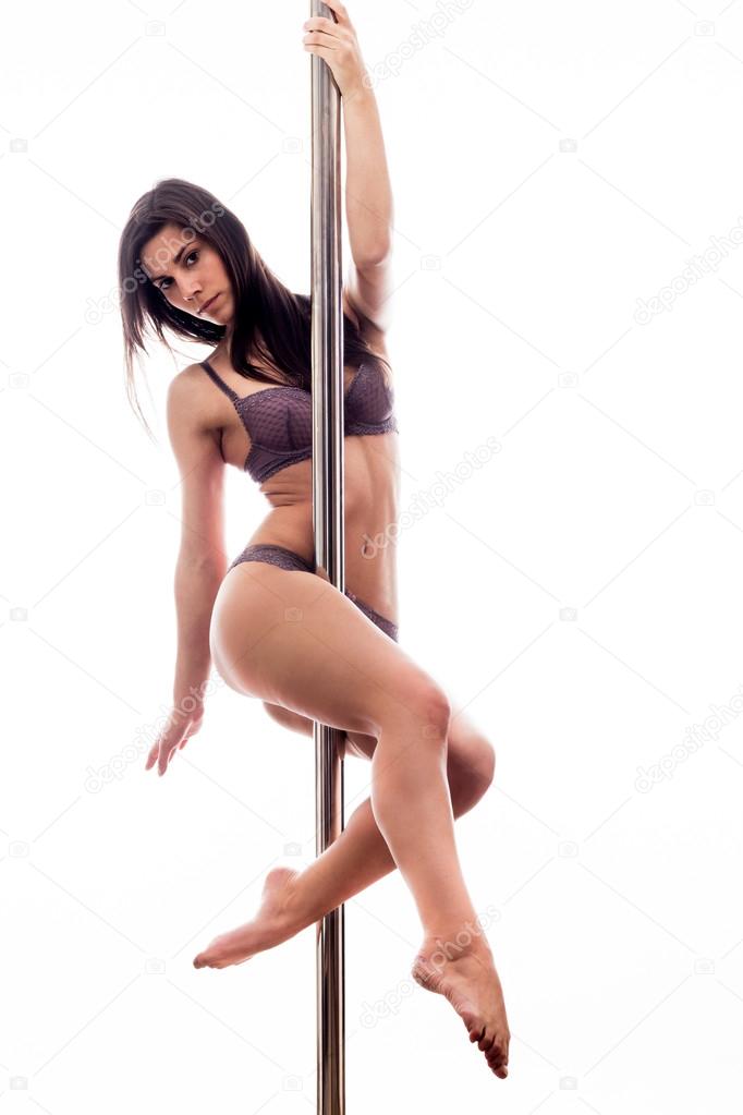 Beautiful young woman exercise pole dance