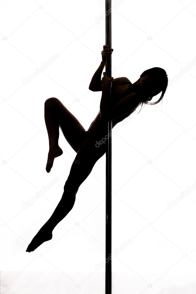 Beautiful young woman exercise pole dance