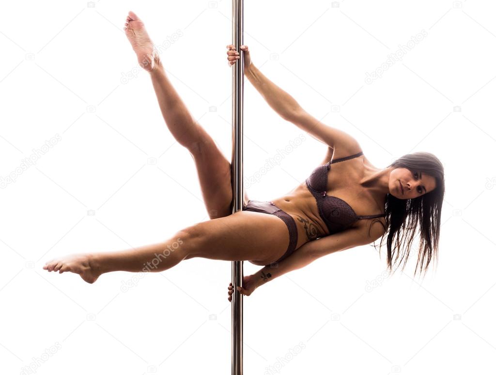 Beautiful young woman exercise pole dance