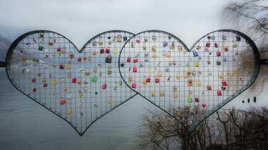Love padlocks on artistic fence clipart