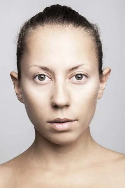 Beautiful woman on gray background — Stock Photo, Image