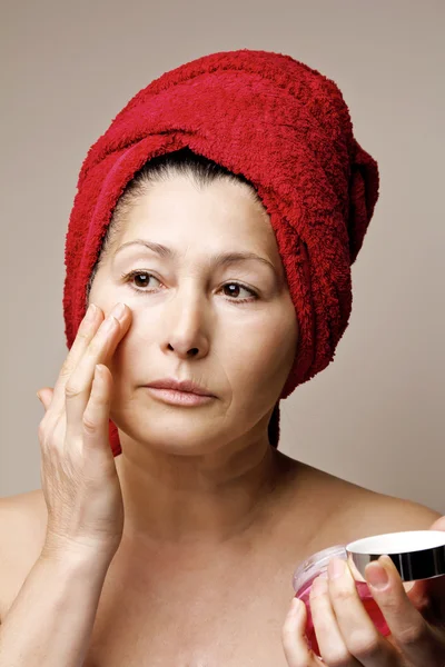 Woman mask on her face — Stock Photo, Image