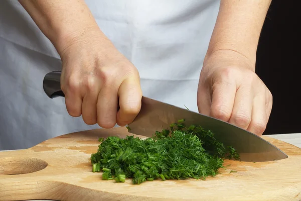 Chopping green dill — Stock Photo, Image