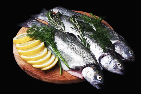 Cooking trout fish with lemon. — Stock Photo, Image