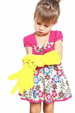 Little girl in rubber gloves in on the white background clipart