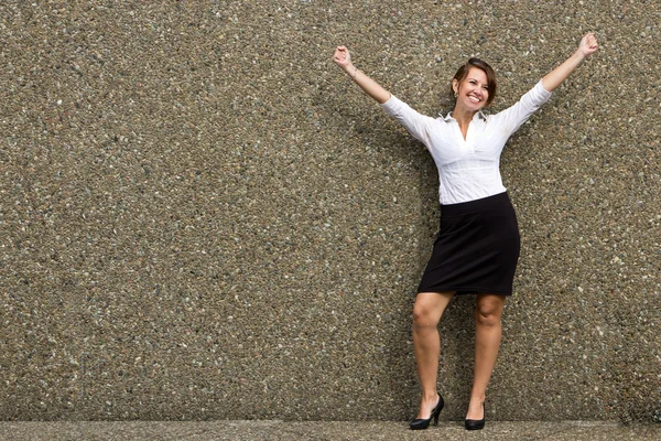 Happy buisness woman with arms up in celebration — Stock Photo, Image