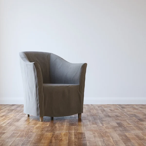 Poltrona grigia accogliente nell'interno vuoto della stanza con il parquet — Foto Stock