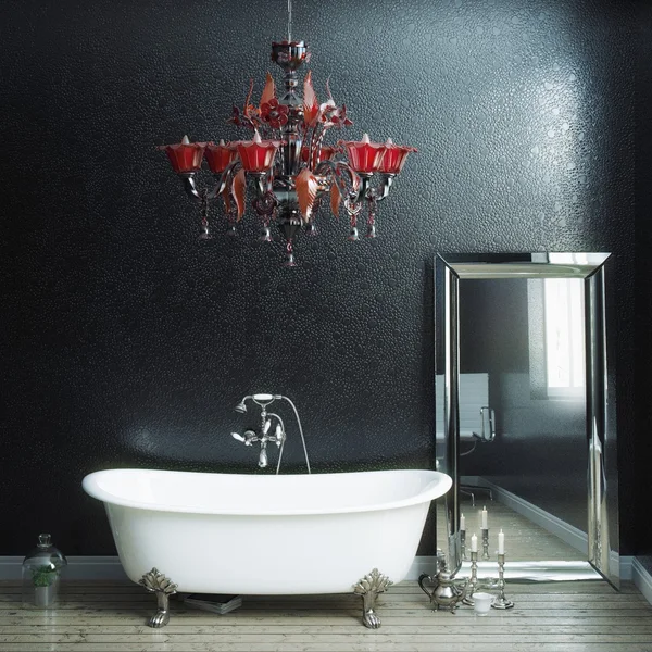 Vintage bathtub and chandelier in black wall interior — Stock Photo, Image