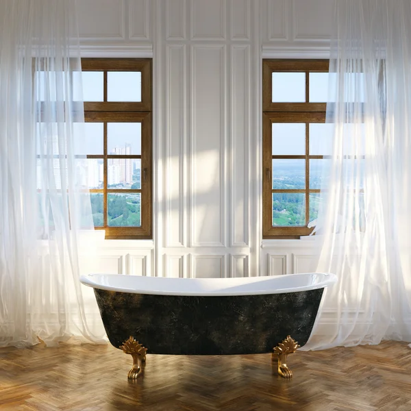 Большая ванная комната с винтажной железной ванной в центре и большие окна — стоковое фото