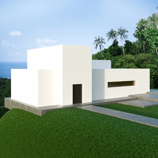 Energy efficient concrete modern house on the hill above the oce Royalty Free Stock Photos