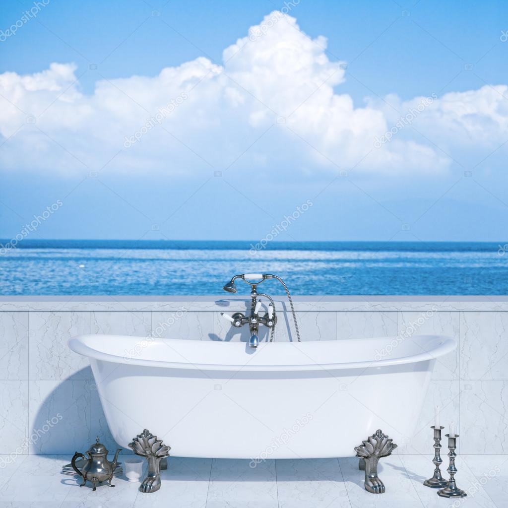Modern bathroom in luxury villa on open air terrace with ocean view