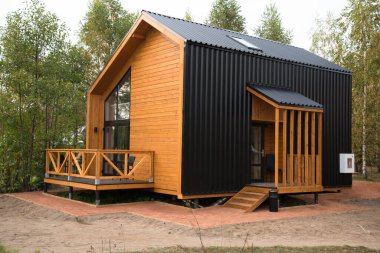 Barnhouse tarzı ev. Doğanın bağrında bir ev. Yeşillik ve ağaçlar