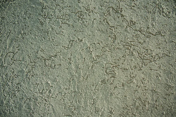 Gray textured background. Concrete wall, embossed texture. Patterned concrete wall — Stock Photo, Image