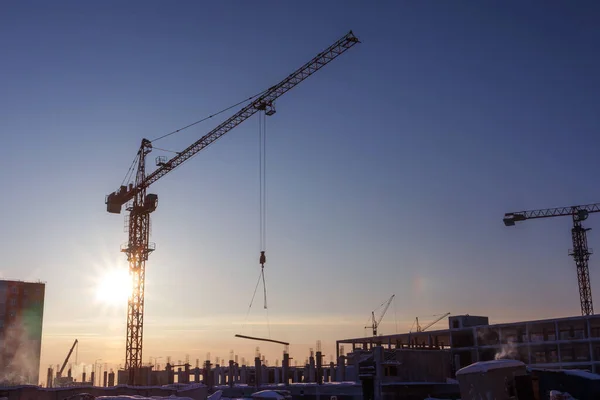 Construction Cranes Winter Cloudyless Sky Rising Sun Background Concept Building — Zdjęcie stockowe