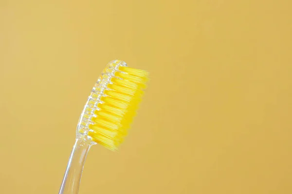 Toothbrush Yellow Bristles Yellow Background Close Oral Hygiene Dentistry Teeth — Stock Photo, Image