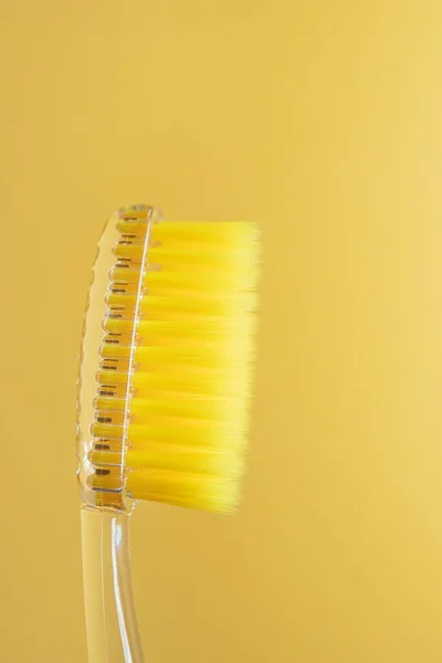 Toothbrush Yellow Bristles Yellow Background Close Oral Hygiene Dentistry Teeth — Stock Photo, Image