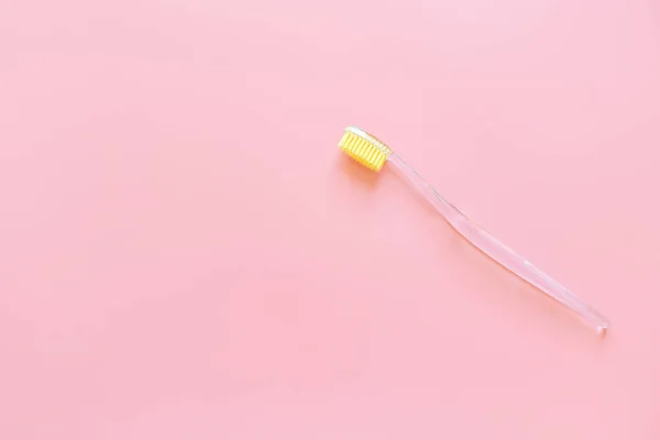 Toothbrush Yellow Bristles Pink Background Oral Hygiene Dentistry Teeth Cleaning — Stock Photo, Image