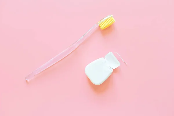 Toothbrush Yellow Bristles Dental Floss Pink Background Oral Hygiene Dentistry — Stock Photo, Image