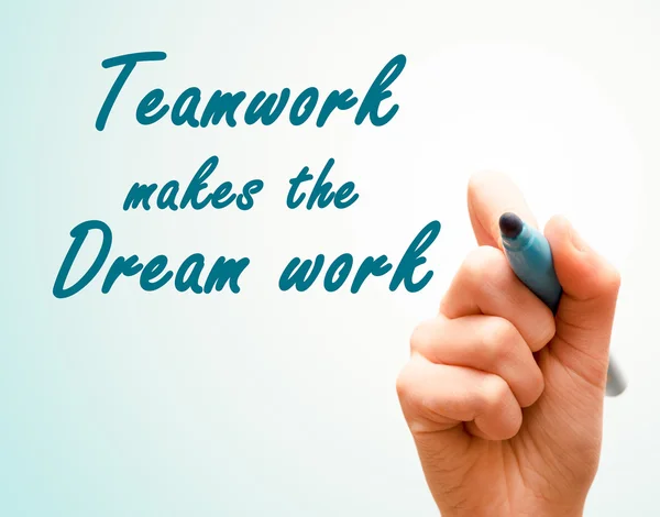 Hand with pen writing team work makes the dream work — Stock Photo, Image