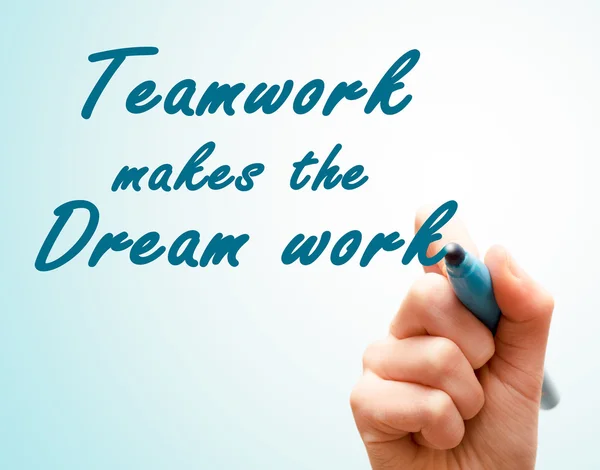 Hand with pen writing team work makes the dream work — Stock Photo, Image