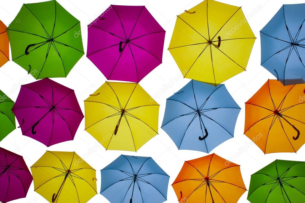 colored umbrellas in the air