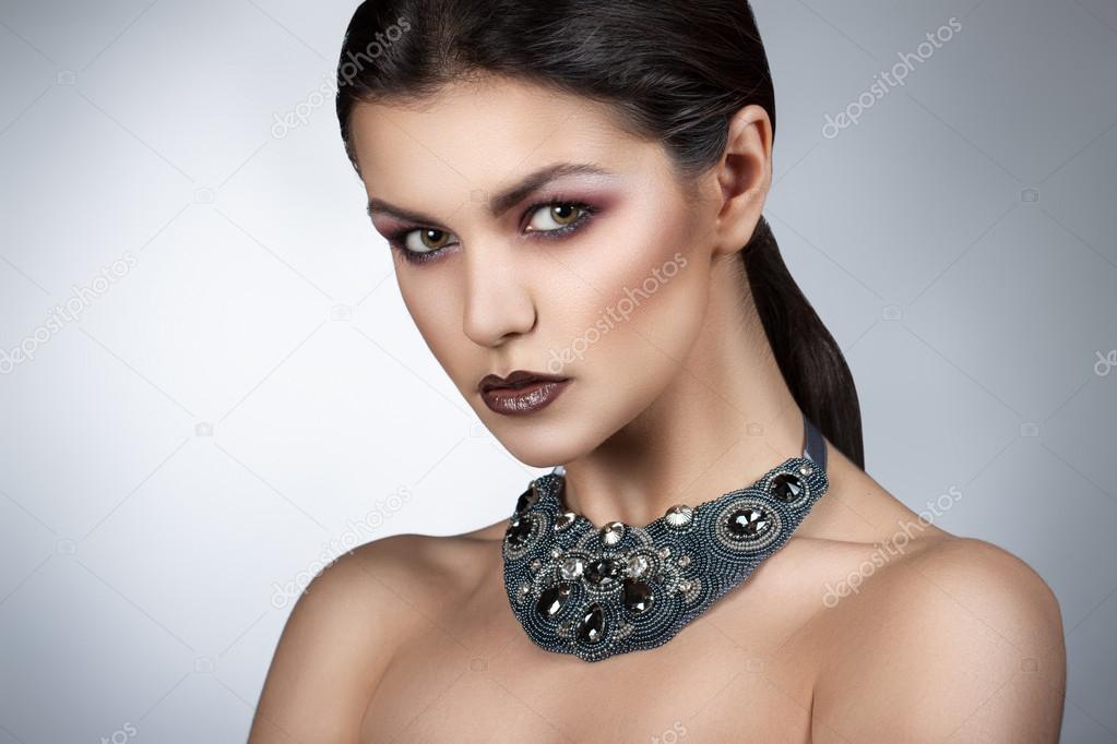 style woman portrait perfect face, professional make.  big eyes, expensive jewelry necklace
