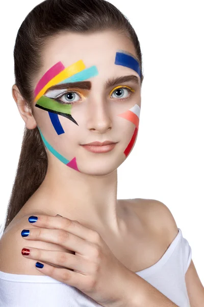 Tini lány színes csíkok az arcon. Világos make-up art. — Stock Fotó