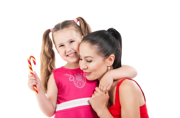 Gelukkige liefdevolle familie. moeder en kind meisje spelen, kussen en knuffelen — Stockfoto