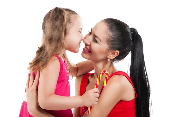 Happy loving family. mother and child girl playing, kissing and hugging — Stock Photo, Image